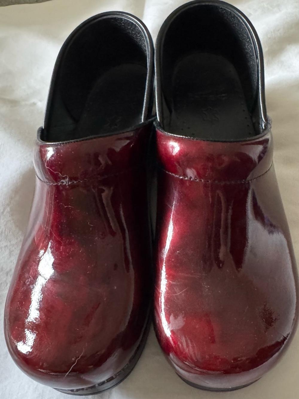 Dansko Women’s Burgundy Patent Leather Clogs